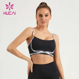 HUCAI Custom Logo Gym Wear Contrast Stitching Jacquard Woven Tape Sexy U Neck Adjustable Strappy Yoga Top Sports Bra For Women