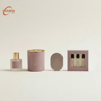 Boîte en carton rigide magnétique de luxe personnalisée pour emballage de bougies parfumées, de parfums solides et d'huiles essentielles avec insert en mousse personnalisé