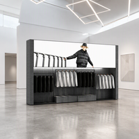 Présentoir mural personnalisé en MDF pour vêtements, style industriel, avec boîte lumineuse pour logo et plateforme étagée