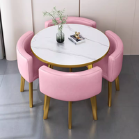 Table à manger ronde de luxe très vendue avec chaises en métal et plateau en MDF pour salon, café, hôtel, cantine, salon de thé
