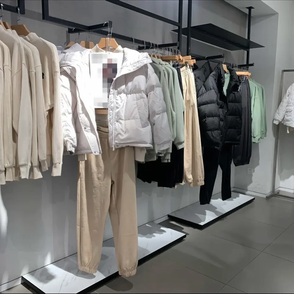 Estante de exhibición de ropa para mujer, colgador de pared, decoración