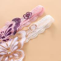 String sexy européen et américain à motif papillon, bordure en dentelle transparente, taille basse, broderie séduisante pour femme