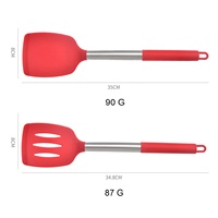 Vente flash Nouveaux grattoirs de cuisine en silicone 2 pièces Poignée en acier inoxydable Résistant aux hautes températures Sans BPA Professionnel