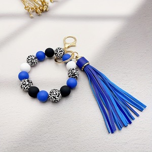 Bracelet créatif en silicone avec des perles rondes en alliage de léopard, impression UV, long pompon doux, cadeau écologique pour hommes et femmes - Product Image 2