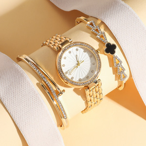Reloj de Pulsera de Acero para Mujer, Diseño de Trébol de Cuatro Hojas, Conjunto de Joyería con Brazalete de Acero Inoxidable - Product Image 1