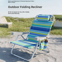 Chaise longue de plage pliable légère à dossier inclinable à 180° avec poche latérale de rangement pour vacances à la plage et au bord de la mer