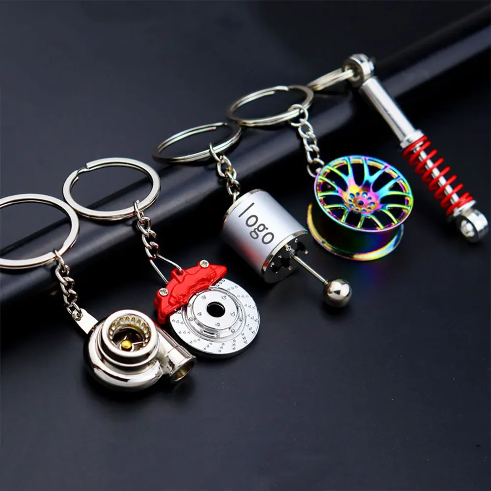 Wholesale creative metal keychain turbo gear hub brake disc shock absorber car keychain pendant