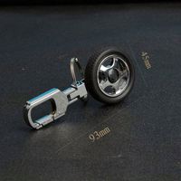 Simulation caoutchouc porte-clés voitures pneu rotatif Auto modèle roue voiture pendentif métal porte-clés pneu automobile partie porte-clés jouets