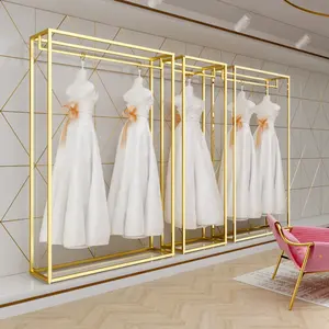 Gelin dükkanı süslemeleri kaplama altın giyim standı düğün elbisesi vitrin rafı perakende butik mağaza mobilyaları