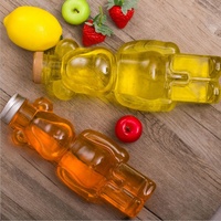 Vente chaude 350ml Bouteille de jus en plastique pour animaux de compagnie en forme d'ours avec bouchon couronne personnalisable pour l'utilisation de boissons au thé et au café