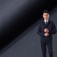 Tissu uniforme TC 80% polyester 20% coton 150-300 g/m² sergé vêtements de travail Ripstop extensible pour vêtements pour garçons sacs robes