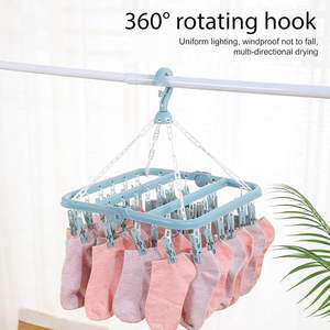 Organizador de Ropa de un Solo Nivel, Plegable, de Plástico, con 32 Pinzas y Colgador de Secado - Product Image 5