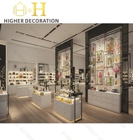 Conception de magasin de parfums de luxe pour les boutiques de vente de parfums |   Fixations d'affichage personnalisées et solutions clés en main pour l'aménagement de boutiques
