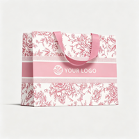 Sac cadeau en papier personnalisé avec ruban intérieur recyclable, poignée en ruban, carton ivoire 190-230 g/m², impression sérigraphique, logo personnalisé, imprimé floral