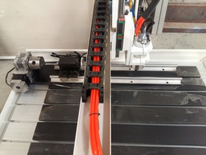 High Efficiency 4 Axis 6040 Wood Carving <b>Machinery</b> with Rotary Axis for Metals Stainless Steel Stone Iron - Product Image 4