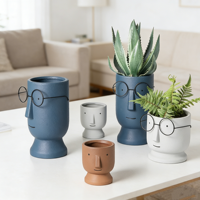 Joli pot de fleurs en céramique en forme de visage avec un design de poupée pour la décoration de la maison et du jardin, ensemble de pots pour plantes succulentes sur le bureau