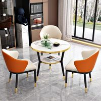 Ensemble de table à manger ronde de luxe en acier inoxydable avec chaises en métal, design moderne, assemblé pour la maison ou le bureau, 1 table et 2 chaises