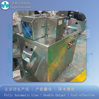 Machine de découpe rotative à vitesse élevée et à longueur fixe pour snacks soufflés / friandises pour animaux de compagnie
