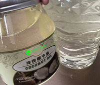 Fabricants chinois d'huile de coco extra vierge pressée à froid 100% issue de noix de coco fraîches biologiques par la méthode de pressage à froid