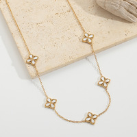 Collier à breloque trèfle à quatre feuilles en acier inoxydable blanc, collier long mini trèfle brillant doré délicat