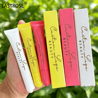Baume à lèvres liquide hydratant en tube souple, à l'huile d'arnica et au palmitoyl tripeptide, fini brillant, végétalien, teinté, baume-lait pour les lèvres aux peptides