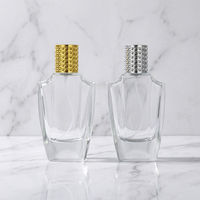 Vente directe usine – Flacon de parfum en verre transparent haut de gamme de 50 ml avec bouchon à vis et sérigraphie pour diffuseur à bâtonnets