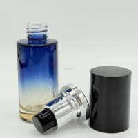 Pompe à escalier argentée de luxe Offre Spéciale et couvercle noir fond de teint 35ml bouteille en verre dégradé jaune et bleu