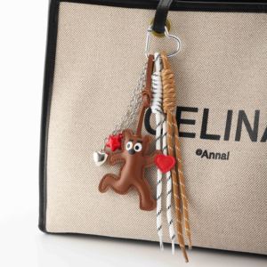 2025 Sản Phẩm Mới Vui Tươi Gấu Nâu Móc Chìa Khóa Với Trái Tim Và Ngôi Sao Điểm Nhấn Trang Trí Tua Sợi Dây Mặt Dây Chuyền Túi Quyến Rũ - Product Image 1