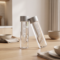 Bouteilles en verre transparent à marque privée avec bouchons à vis personnalisés pour l'emballage de jus pressé à froid, smoothies et boissons détox