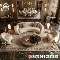 Ensemble de meubles de salon sur mesure, canapé sculptural incurvé en bouclette, table basse, personnalisation complète pour projet de villa de luxe