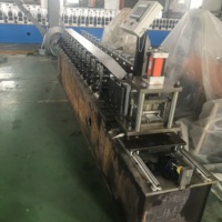 Meilleur prix, état neuf, machine de profilage de lames de porte à enroulement en acier, moteur, boîte de vitesses, roulement pour usage sur toiture