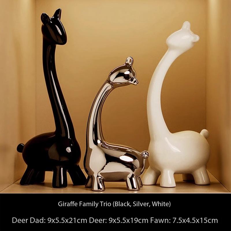Three giraffe ornaments