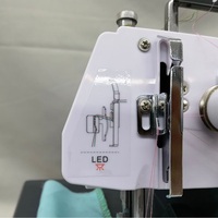 Machine à coudre surjeteuse miniature pour la maison, portable, à quatre fils, avec moteur intégré