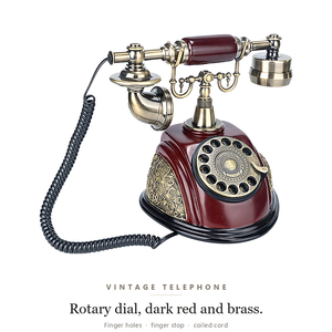 Téléphone rotatif vintage en laiton rouge foncé, téléphone filaire antique avec cordon enroulé - Product Image 1