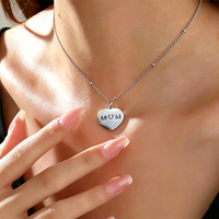 Collier pendentif en forme de cœur Miou plaqué or, imitation acier inoxydable, chaîne à maillons, lettres ajourées MAMAN, tendance pour femme