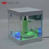 TERMEIN Boîte de présentation pour figurines avec projecteur LED RGB en acrylique écologique, base rotative, prise 12V
