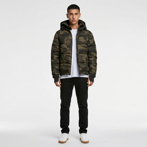 Veste matelassée élégante en toile pour homme, légère et isolante, avec logo frontal, idéale pour les voyages et le quotidien - Product Image 1