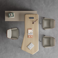 Bureau de direction en L haut de gamme : MDF avec laminage thermique, bords arrondis doux, gestion intégrée des câbles et quincaillerie robuste