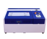 Machine de gravure/découpe laser CO2 4040 60W/40W Haute sécurité Économie d'énergie Refroidie à l'eau pour le bois Multifonctionnelle Écologique