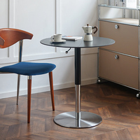 Table à manger ronde réglable en pierre frittée de luxe léger avec pieds en métal, design moderne, élévation hydraulique, résistante aux rayures et à la chaleur