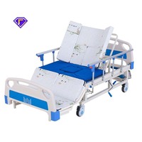 Lit médical Kangluo modèle LOF-897 à double manivelle manuelle avec barrière de sécurité pour patients à mobilité réduite