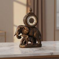 Horloge mécanique à mouvement automatique en laiton finition bronze, motif figuratif français antique « Éléphant et son bébé »