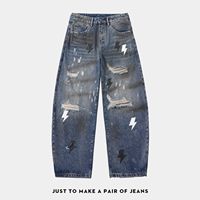 Jean pour homme Y2K en denim déchiré avec patch en cuir, effet vieilli et peinture bleue, style streetwear vintage, qualité supérieure, personnalisable OEM/ODM, collection 2026