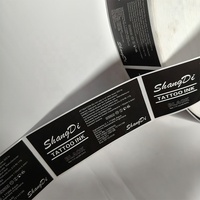 Étiquettes résistantes à l'huile imprimées CMJN en rouleau avec logo personnalisé pour bouteilles d'encre de tatouage et contenants cosmétiques