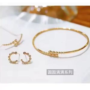 Ensemble de bijoux en diamants Xinfly AU750 en or jaune 18 carats comprenant un collier, des boucles d'oreilles et un bracelet - Bijoux gageables - Product Image 1