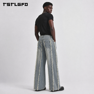 Pantalones vaqueros de pierna ancha con flecos, de tejido grueso, lavado vintage, paneles, estilo streetwear, cintura con cordón y flecos laterales, venta al por mayor - Product Image 1