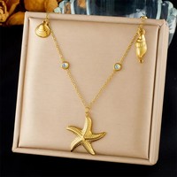 Collier en acier inoxydable plaqué or avec breloques coquillage, étoile de mer et conque, perle, pour femme, idéal pour les vacances à la plage - Vente en gros de bijoux en acier inoxydable