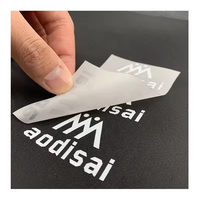 Sérigraphie PVC tissée personnalisée transfert DTF autocollant impression par transfert de chaleur pour vêtements thermocollants étiquettes de vêtement prêtes à presser
