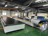 Machine de découpe et d'étalement de tissu intégrée à commande PLC entièrement automatique à double ligne pour le textile domestique
