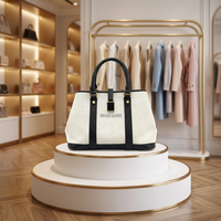 Bolso Tote de Lona de Color Sólido en Cuero Genuino Personalizado SHX - Bolso Tipo Satchel Negro y Blanco con Herrajes Dorados